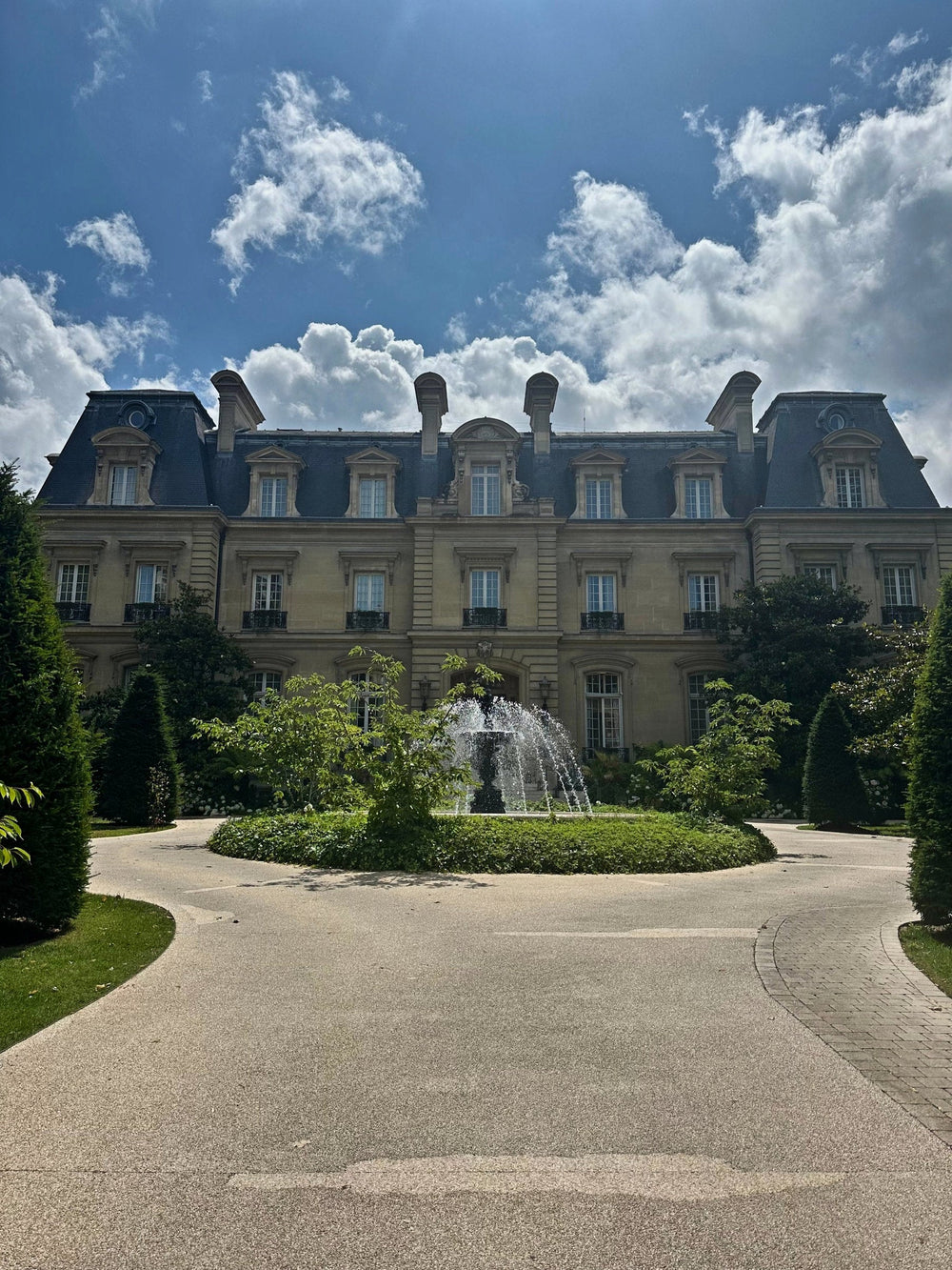 The château façade and fountain at Saint James Paris