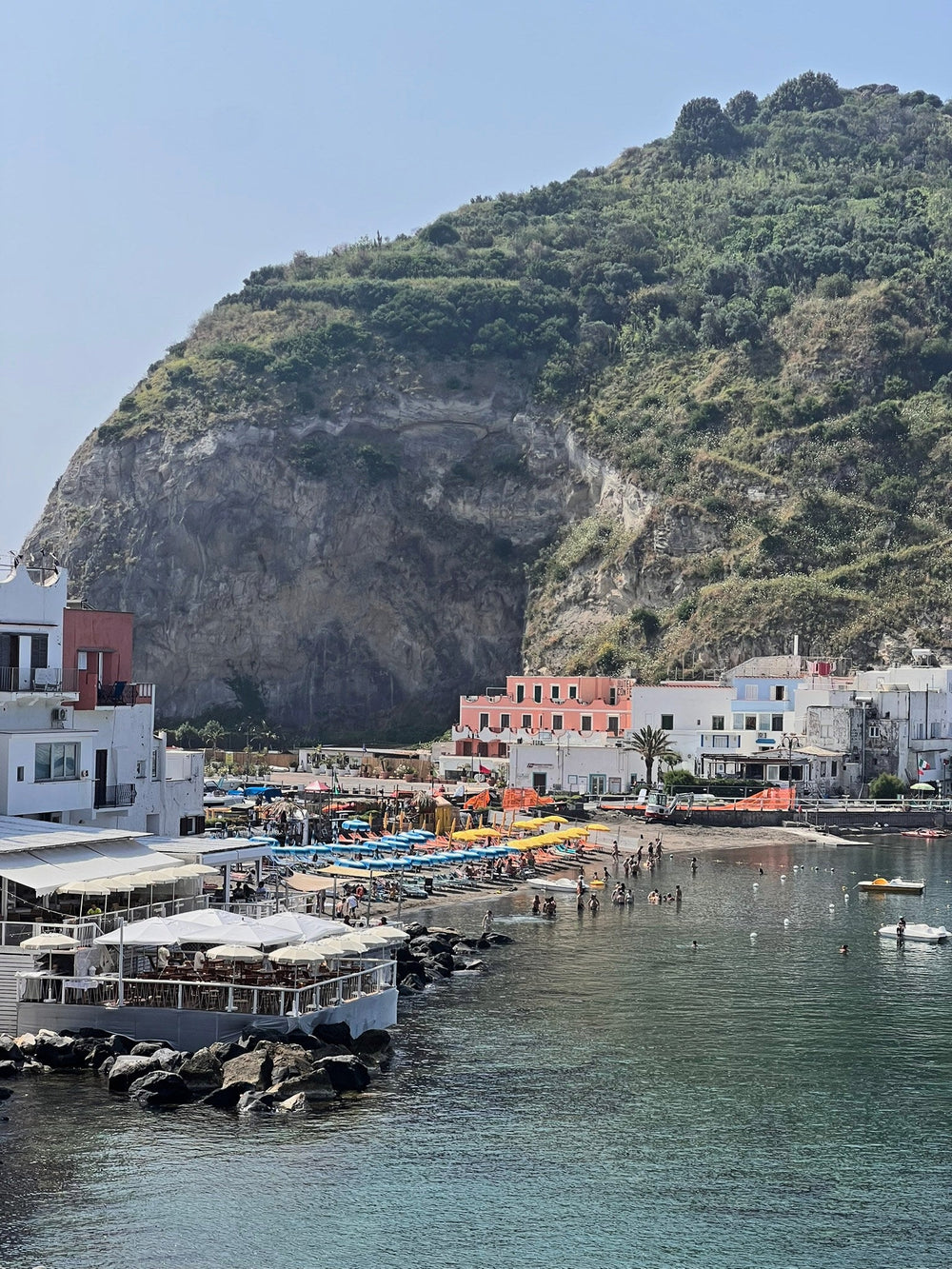 The bay and beach clubs of Sant'Angelo below the headland, Ischia