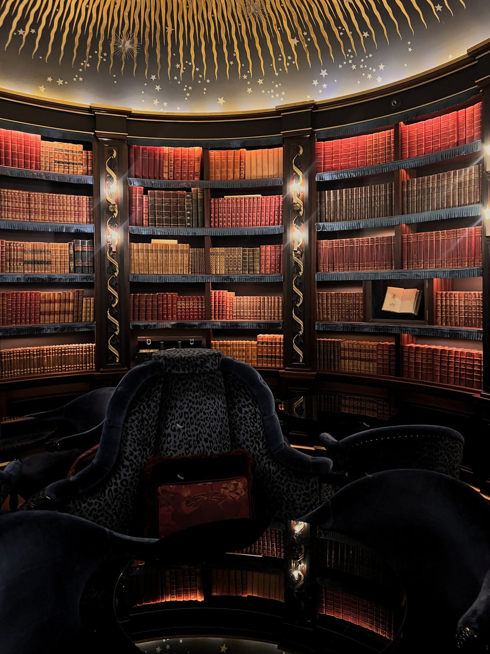 The round library with a gold star ceiling at Maison Proust, Paris