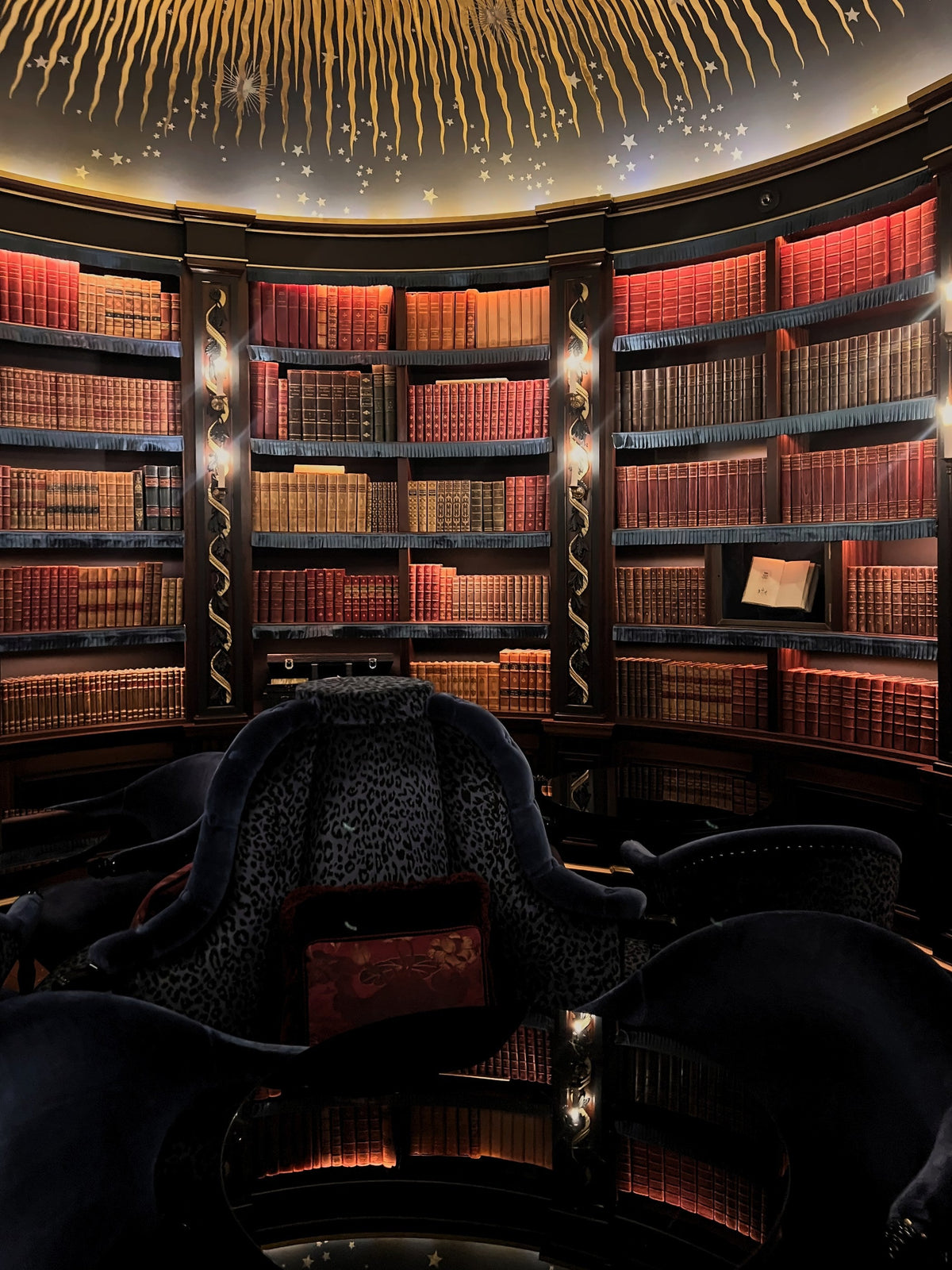 The round library with a gold star ceiling at Maison Proust, Paris