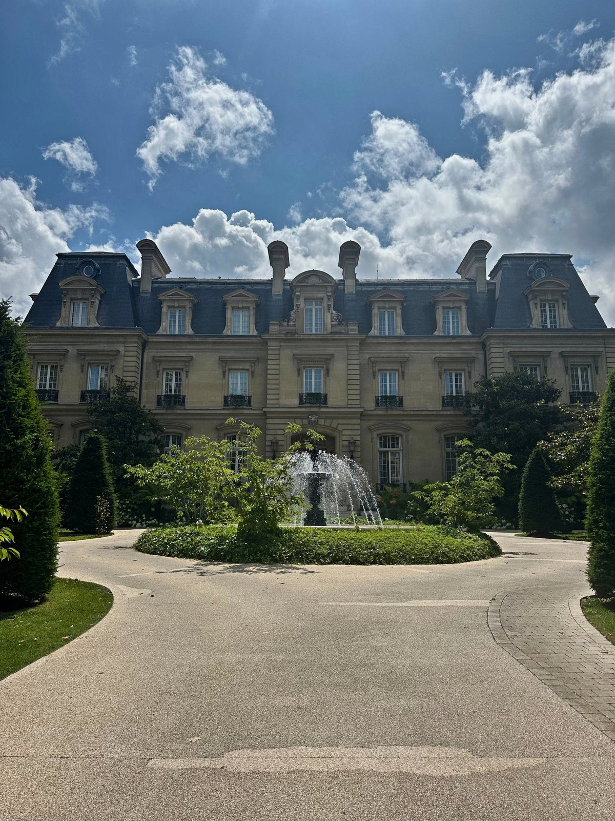 The château façade and fountain at Saint James Paris