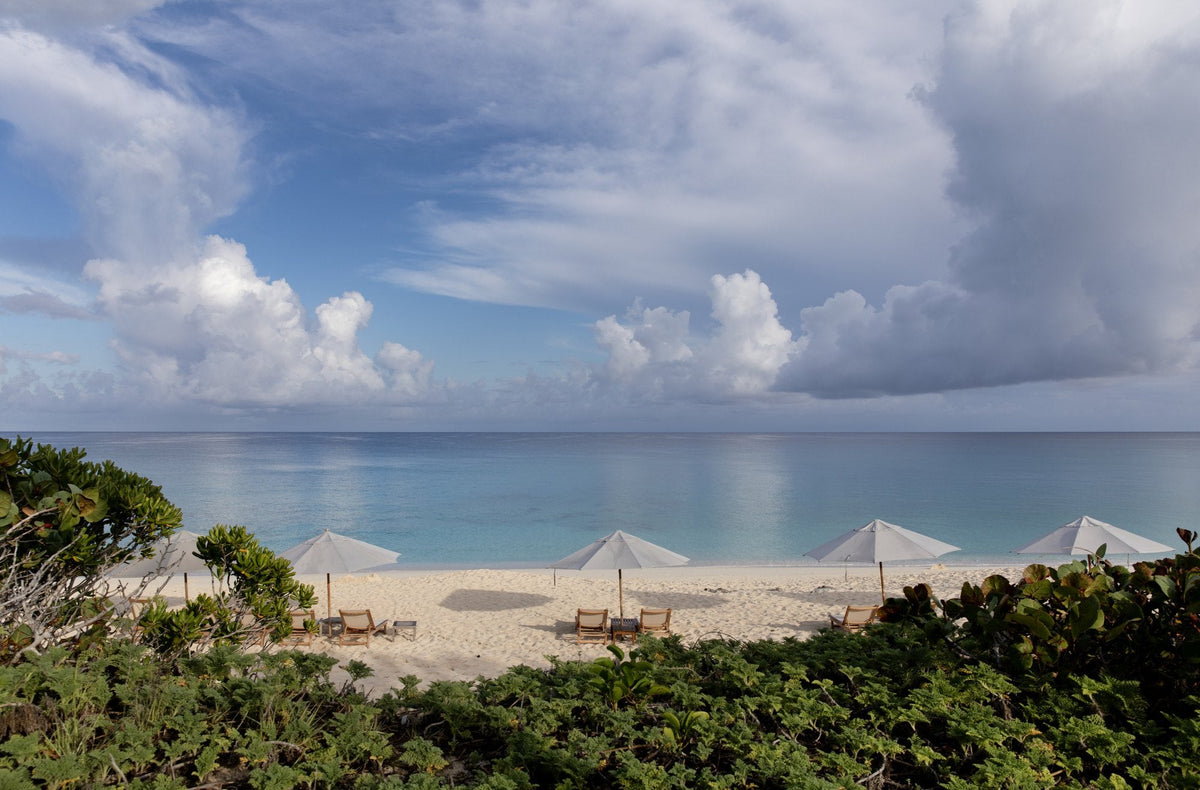 Beach umbrellas on the horizon, Turks & Caicos